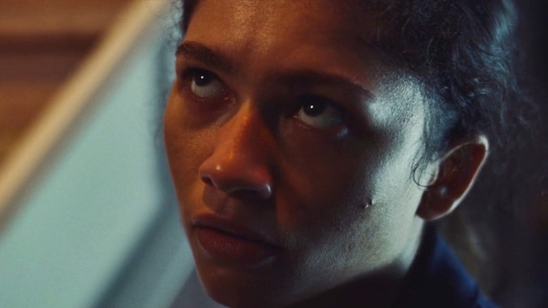 Rue looking at Ali