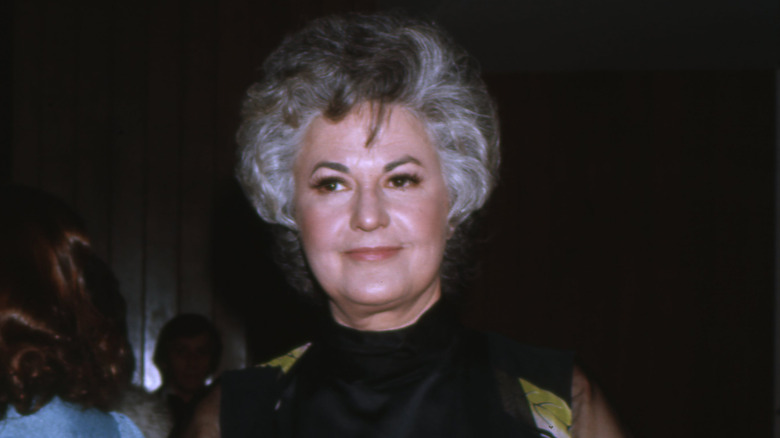 Bea Arthur wearing a black dress at an event.