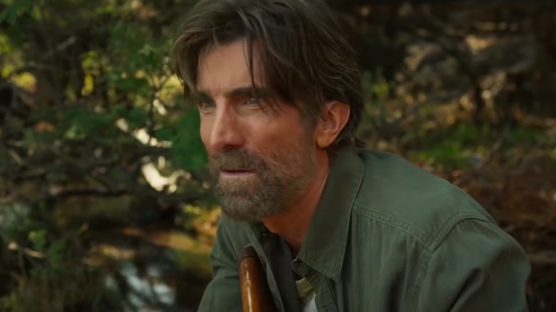 Sharlto Copley hunts for lion