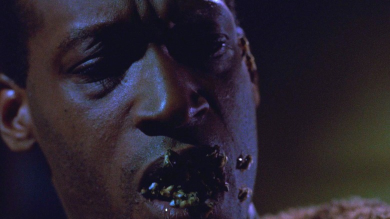 Candyman with bees in mouth