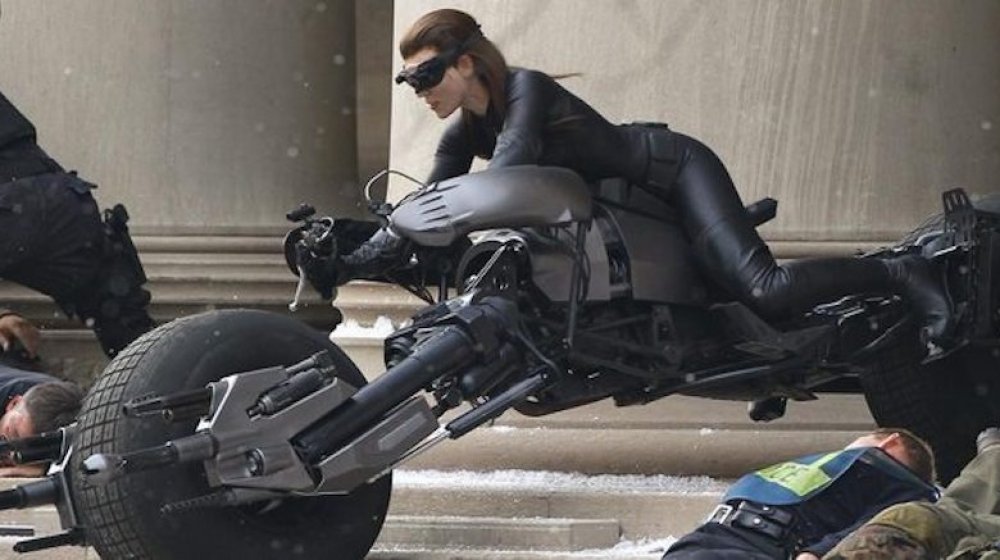 Anne Hathaway on a motorcycle as Catwoman