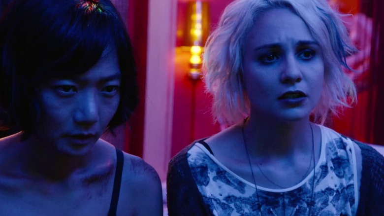 Sun and Riley look worried in "Sense8"