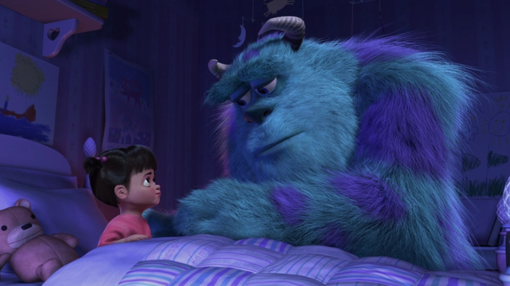 Sulley tucks Boo into bed