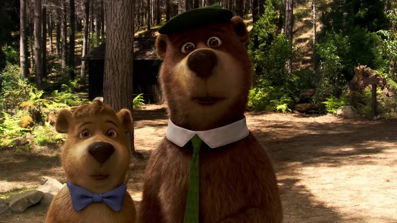 Yogi Bear stands with Boo Boo