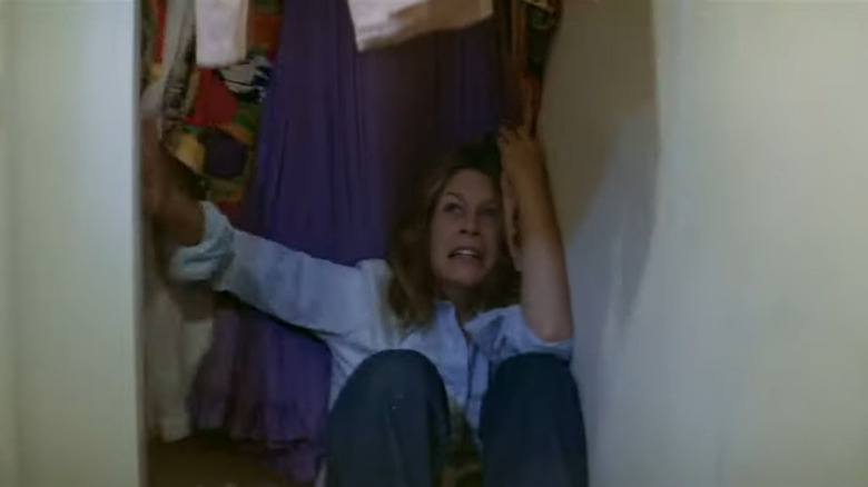 Laurie hides in the closet