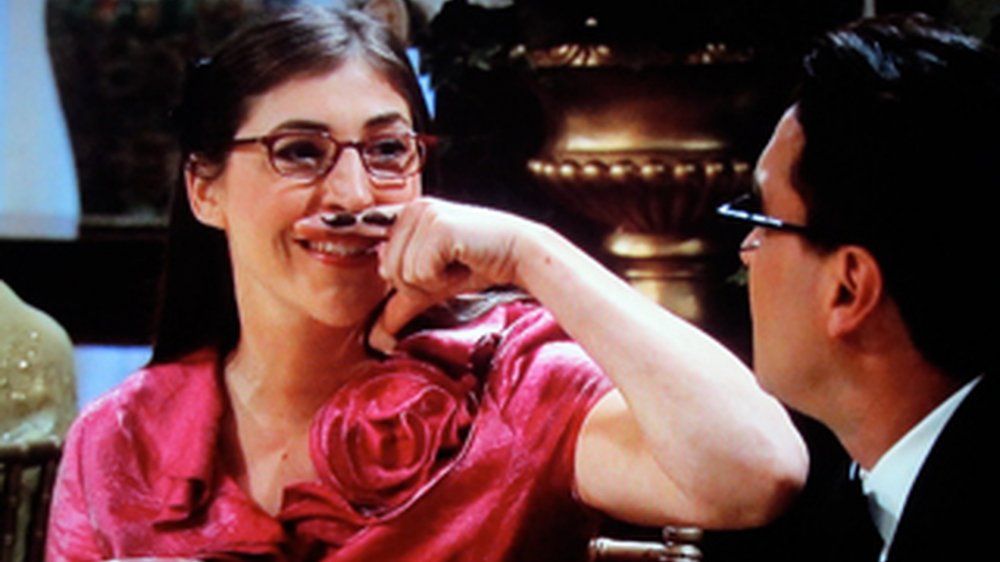 Mayim Bialik as Amy Farrah Fowler with his finger mustache on The Big Bang Theory