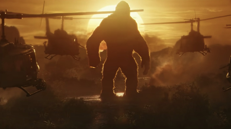 silhouette of king kong with helicopters