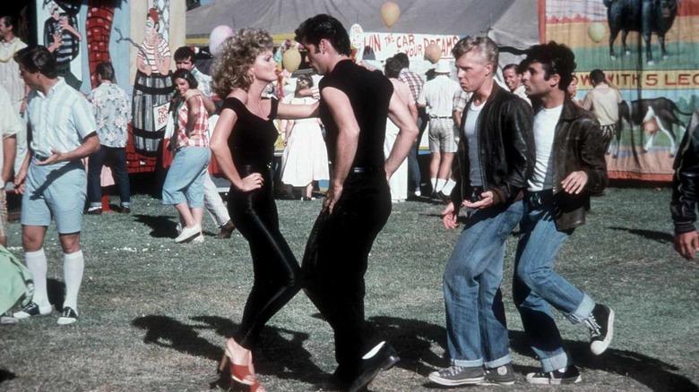 cast of Grease dancing