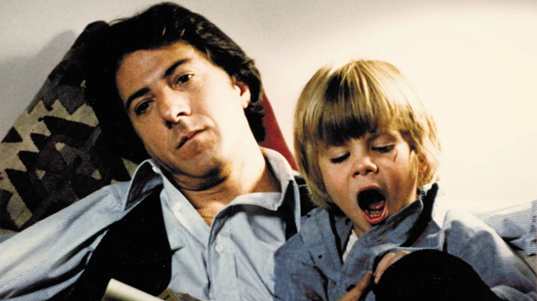 Dustin Hoffman and kid on bed