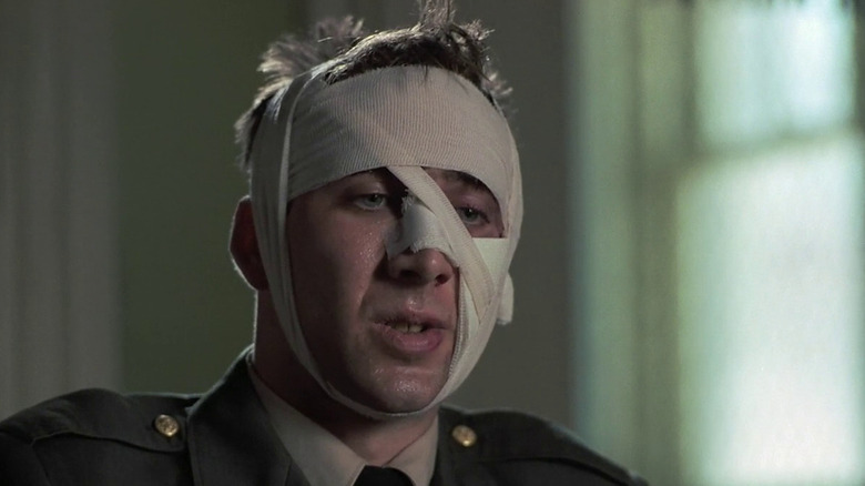 Al Columbato's head is bandaged