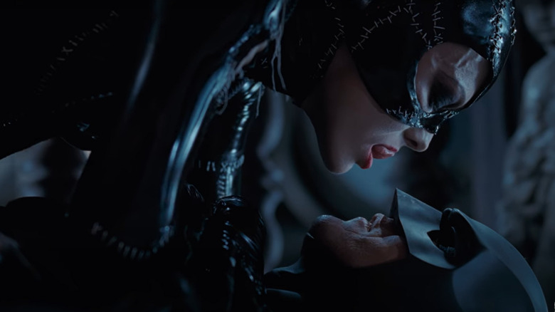 Catwoman licks Batman