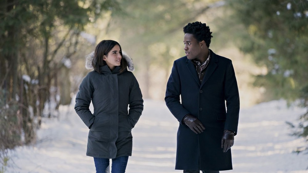 Isabela Moner as Julie Reyes and Shameik Moore as Stuart Bale in Let It Snow