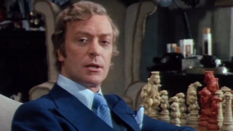 Michael Caine by chess board