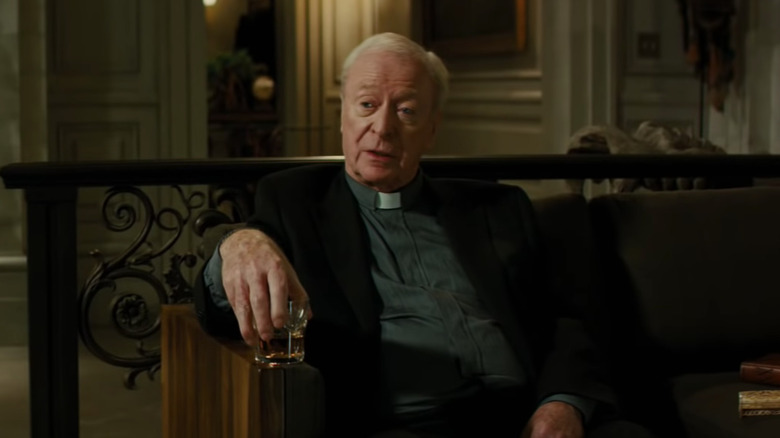 Michael Caine in priest outfit