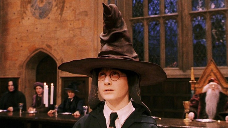 Harry tries on the Sorting Hat