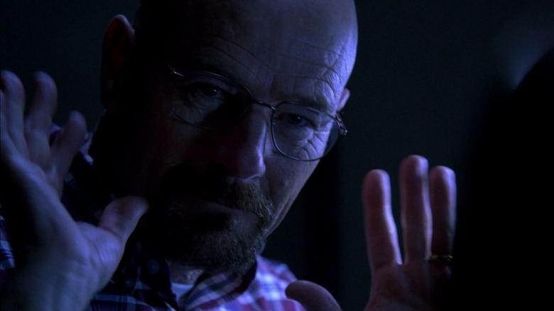 Walter White holding up hands