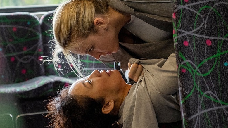 Sandra Oh pinned down by Jodie Comer