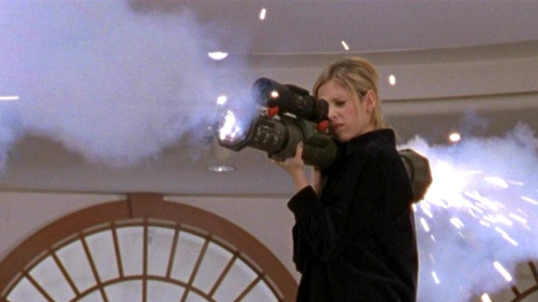 Buffy aiming rocket launcher