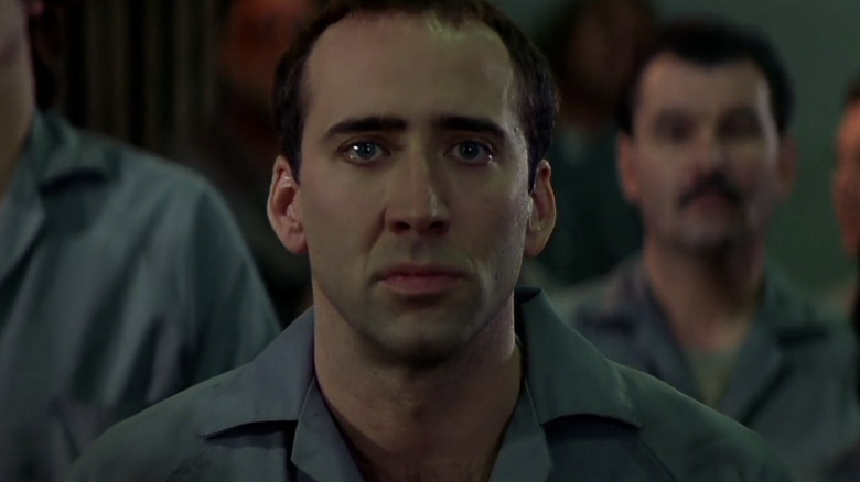 Nicolas Cage in a prison jumpsuit