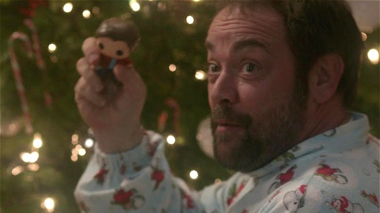 Crowley opens gifts