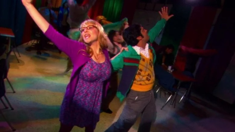 Raj and Bernadette dancing together