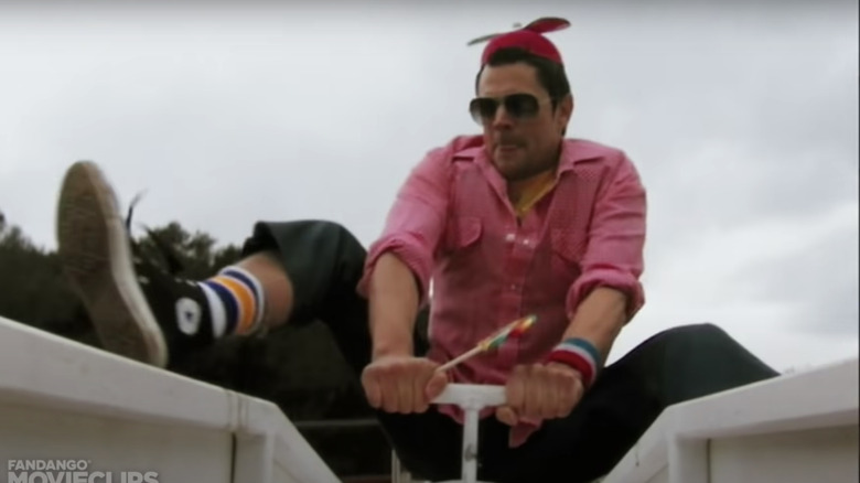 Johnny Knoxville on a seesaw Jackass
