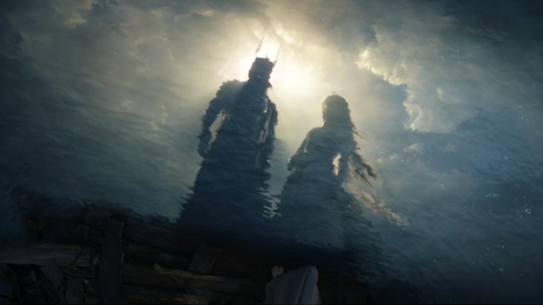 Sauron and Galadriel in a reflected vision