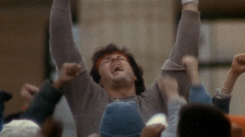 Sylvester Stallone and a crowd of kids in "Rocky II"