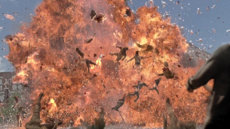 Walkers flung by fiery explosion