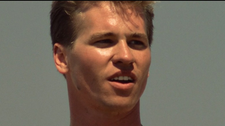 Iceman shirtless playing volleyball