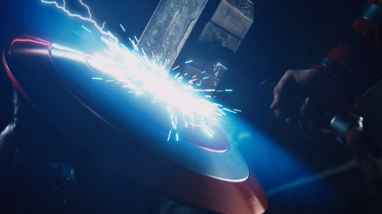 Captain America's shield meets Thor's hammer in "Marvel's The Avengers."