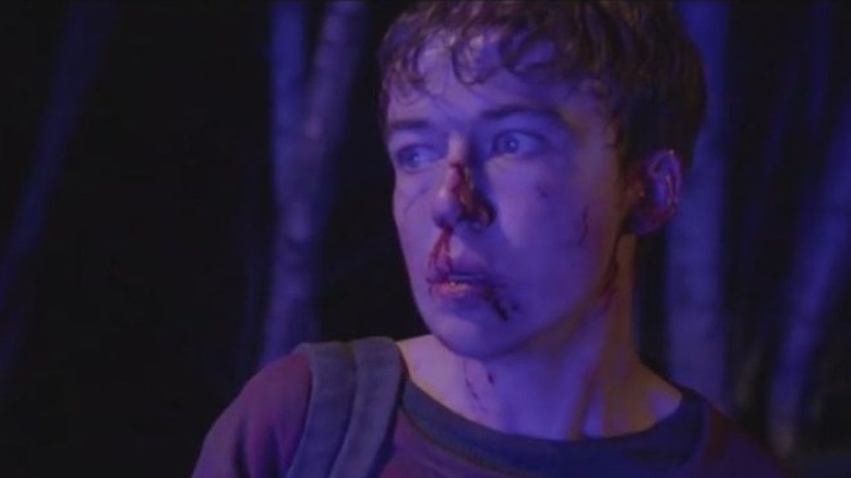 Alex Lawther bloodied terrified