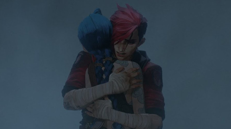 Vi and Powder share a hug