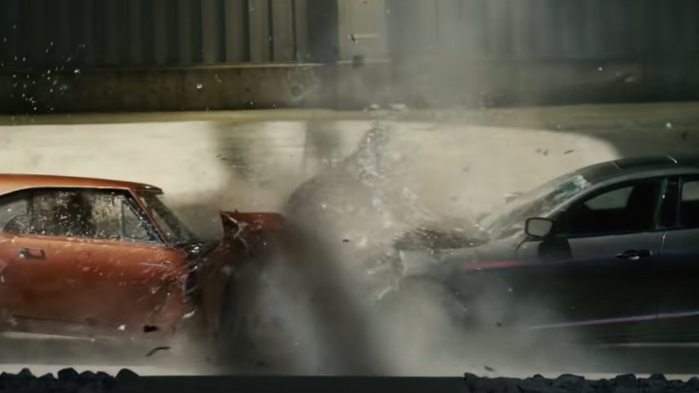 Two cars collide head on in a clip from Furious 7