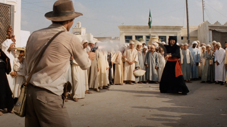 Indiana Jones shoots swordsman