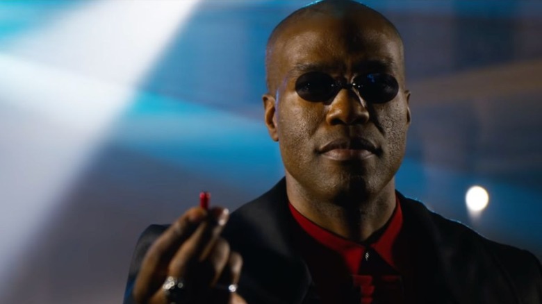 Morpheus holding the red pill