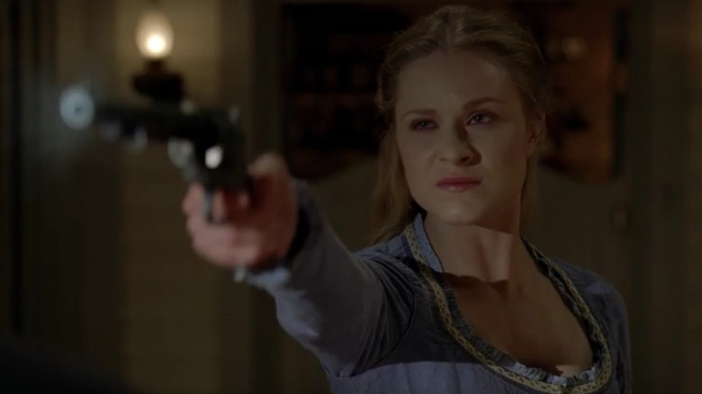 Dolores pointing pistol