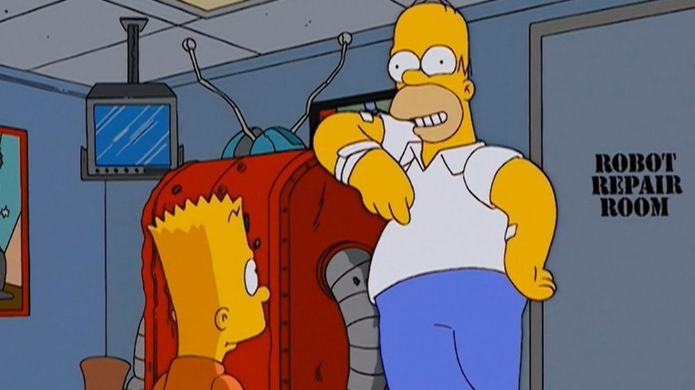 Homer Simpsons with his battered robot in "I, (Annoyed Grunt)-bot" on The Simpsons