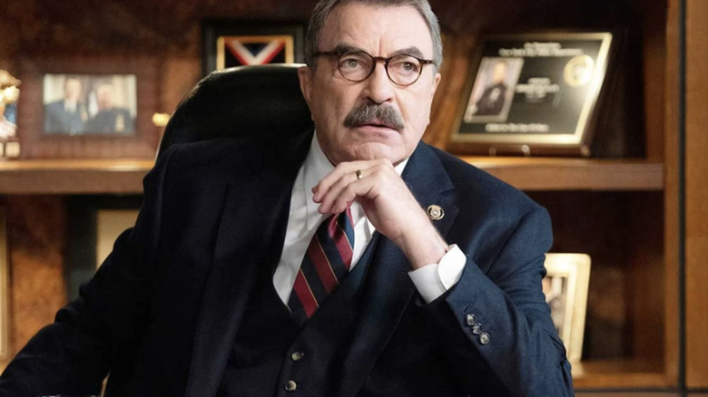 Frank Reagan at his desk