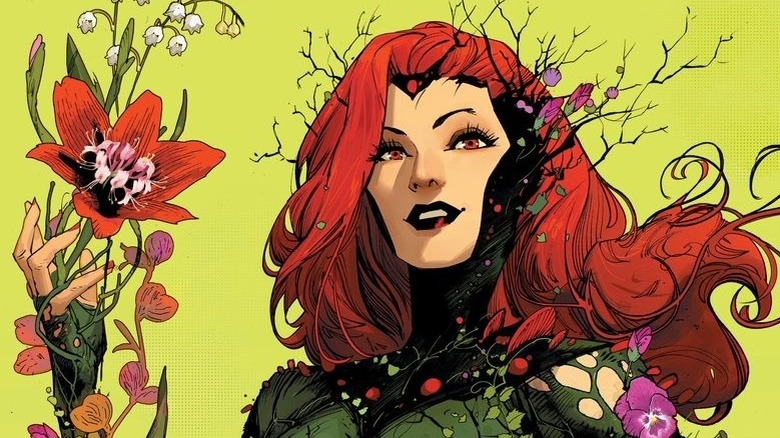 Poison Ivy holding up a strange flower