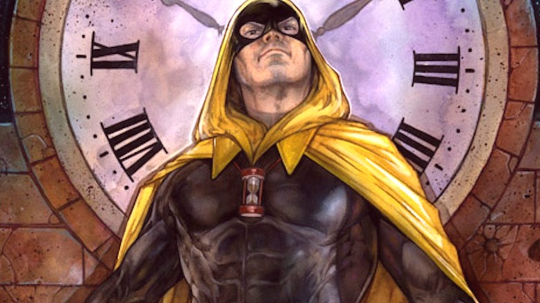 Hourman standing in front of a large clock looking up