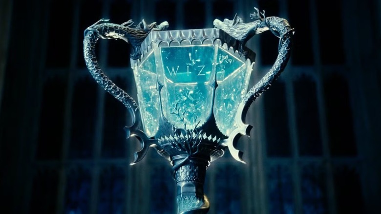 Cedric Diggory touching the Goblet of Fire as a portkey