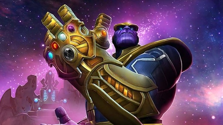 Thanos holds up the Infinity Gauntlet in Marvel: Contest of Champions