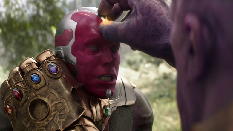 Thanos removes the Mind Stone from Vision's head in Avengers: Infinity War