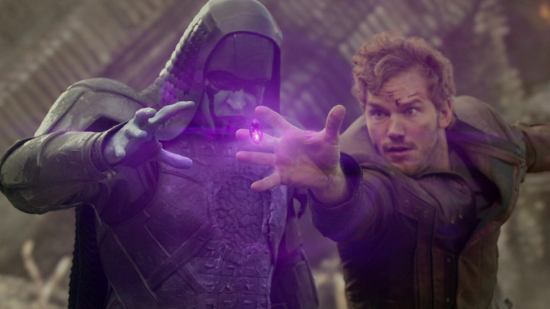 Ronan and Starlord both reach for the Power Stone