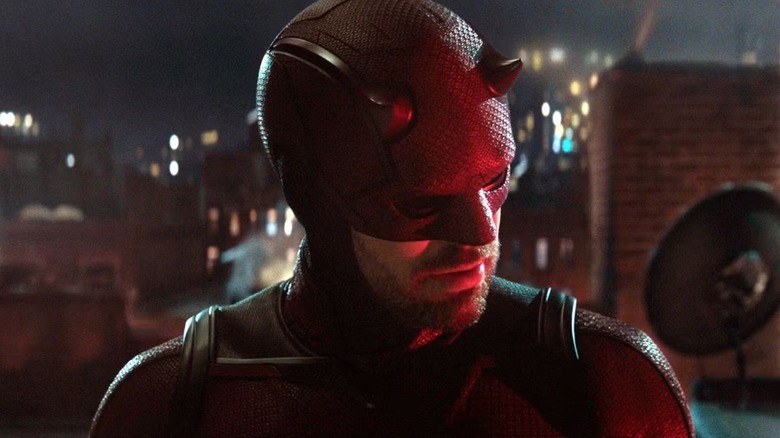 Matt Murdock on top of a building in his Daredevil costume at night