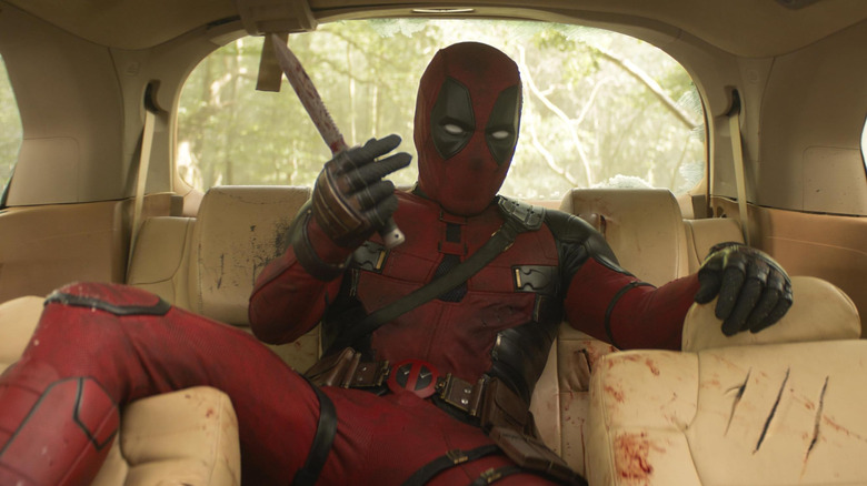 Deadpool in the backseat of a car in Deadpool & Wolverine