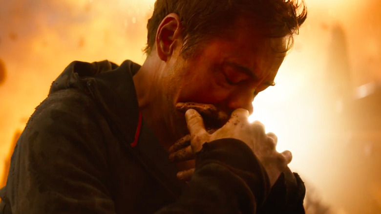 Tony Stark hugging Peter Parker