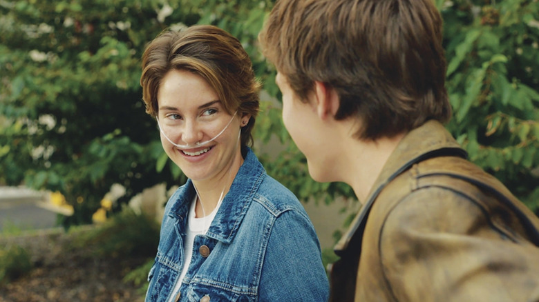 Hazel smiling at Gus