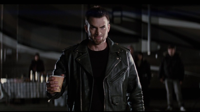 Lucas Lee holding coffee cup